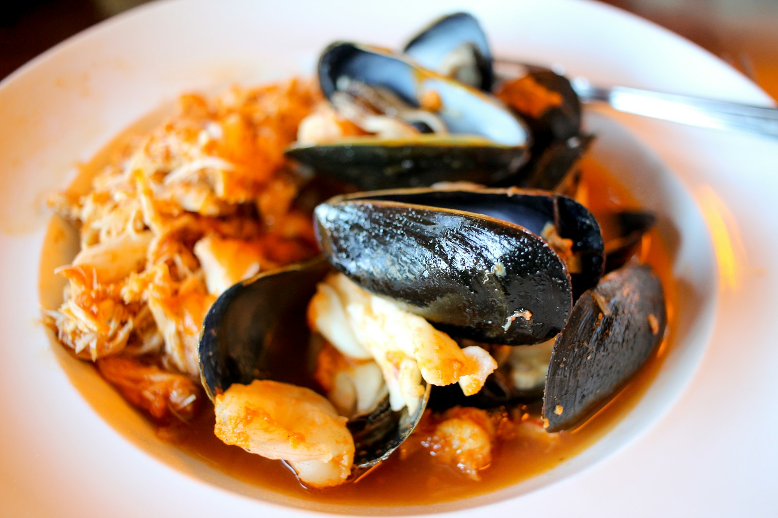 Seafood stew with mussels in tomato broth