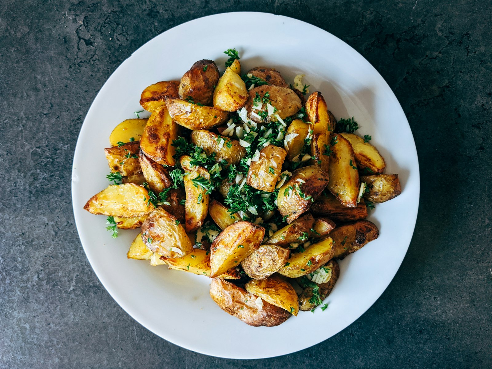 Roast chicken with potatoes and greens