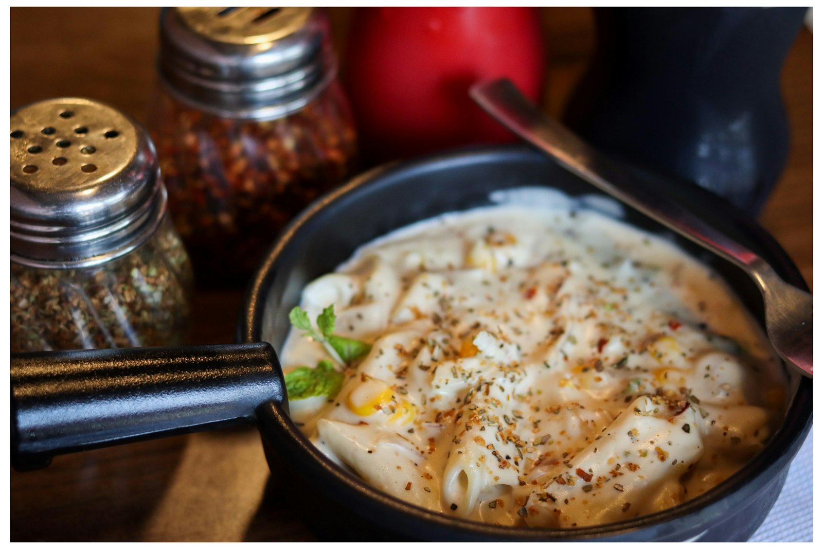 Italian American baked ziti with melted cheese