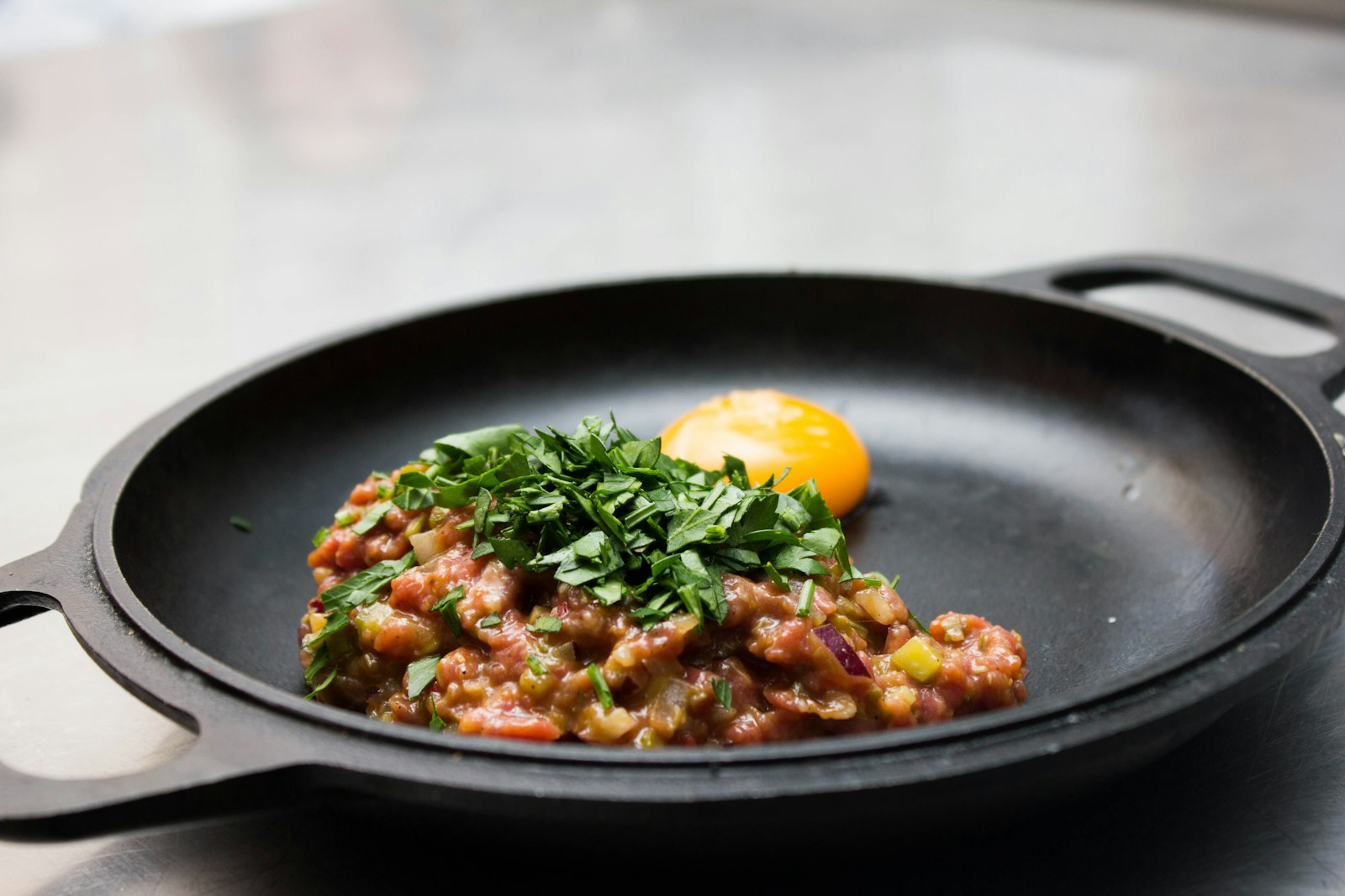 Kefta meatball tagine with eggs in a skillet