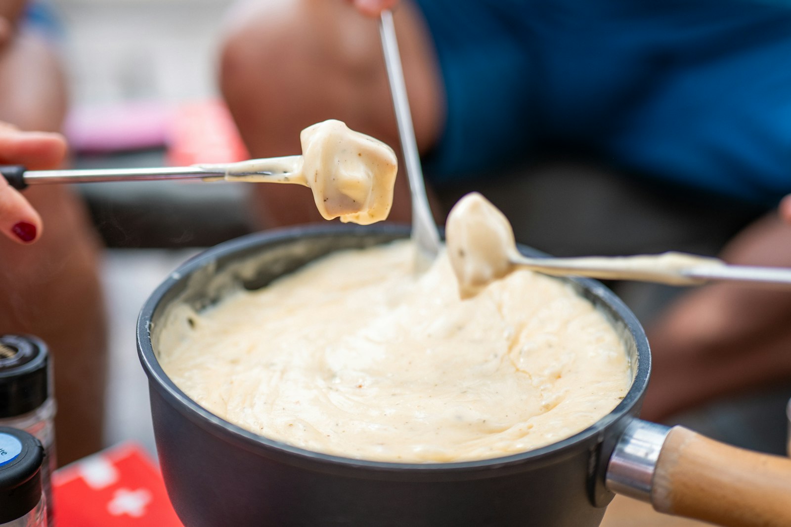 Cheese fondue pot with bread