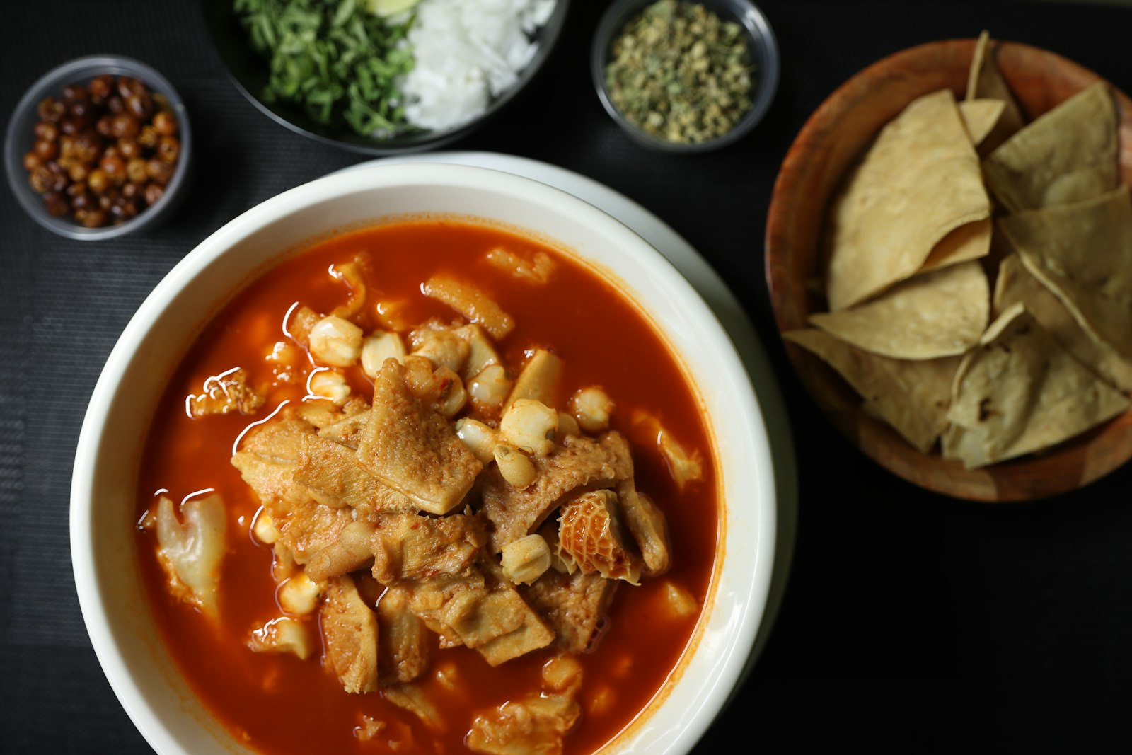 Chicken tortilla soup topped with crispy tortilla strips