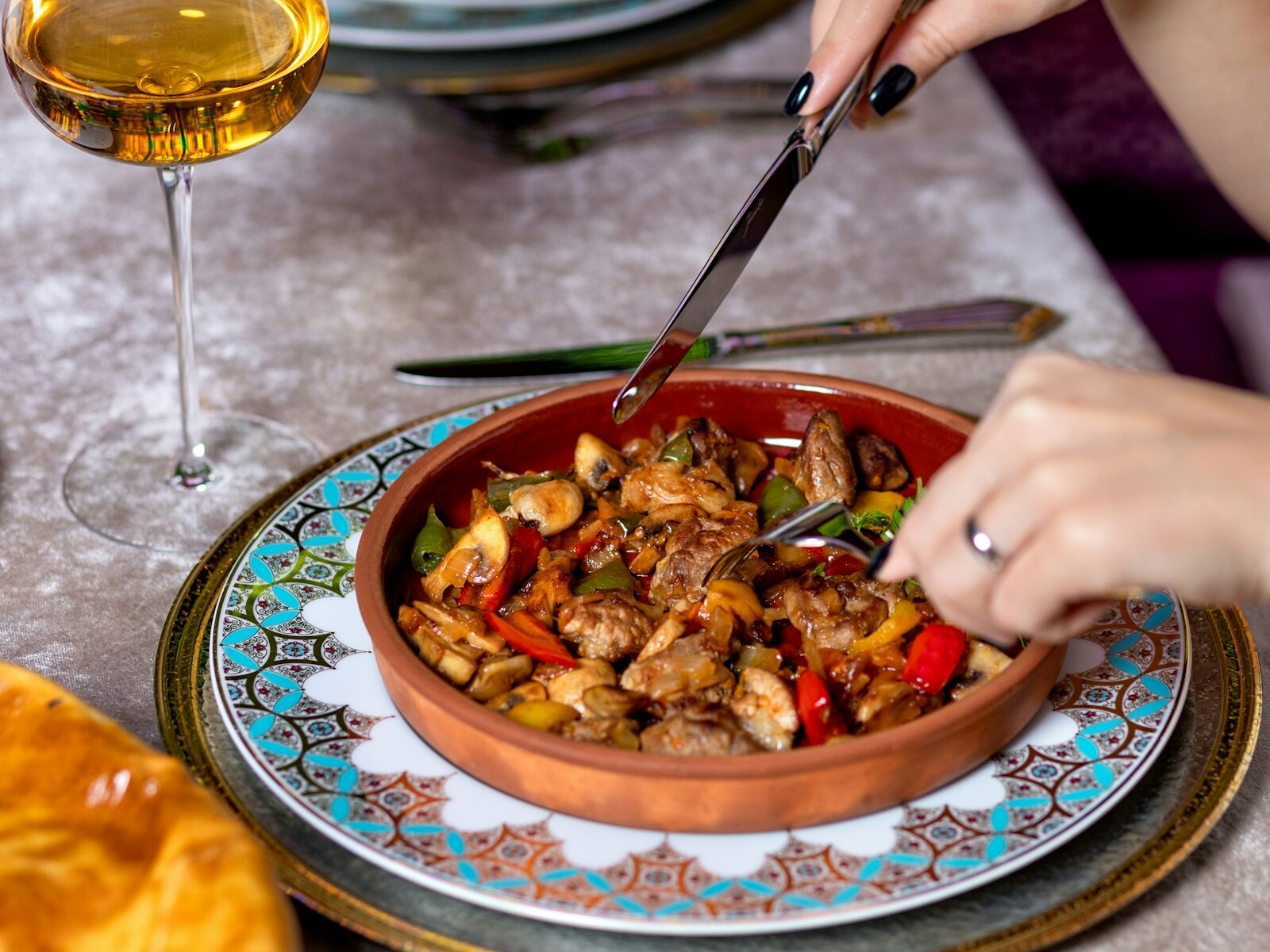 Baked meatballs with roasted vegetables in a bowl