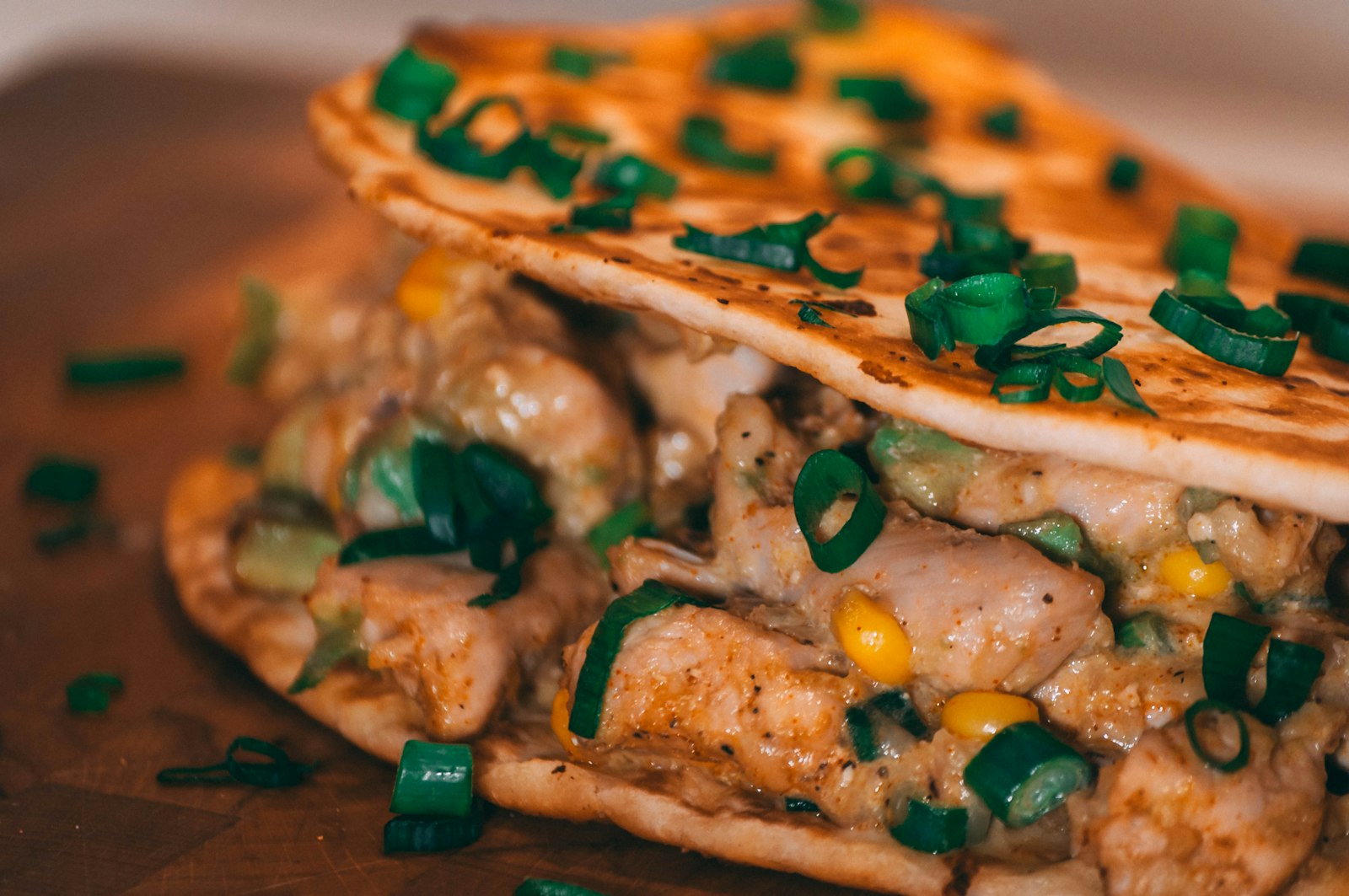 Crispy baked chicken quesadilla with fresh herbs