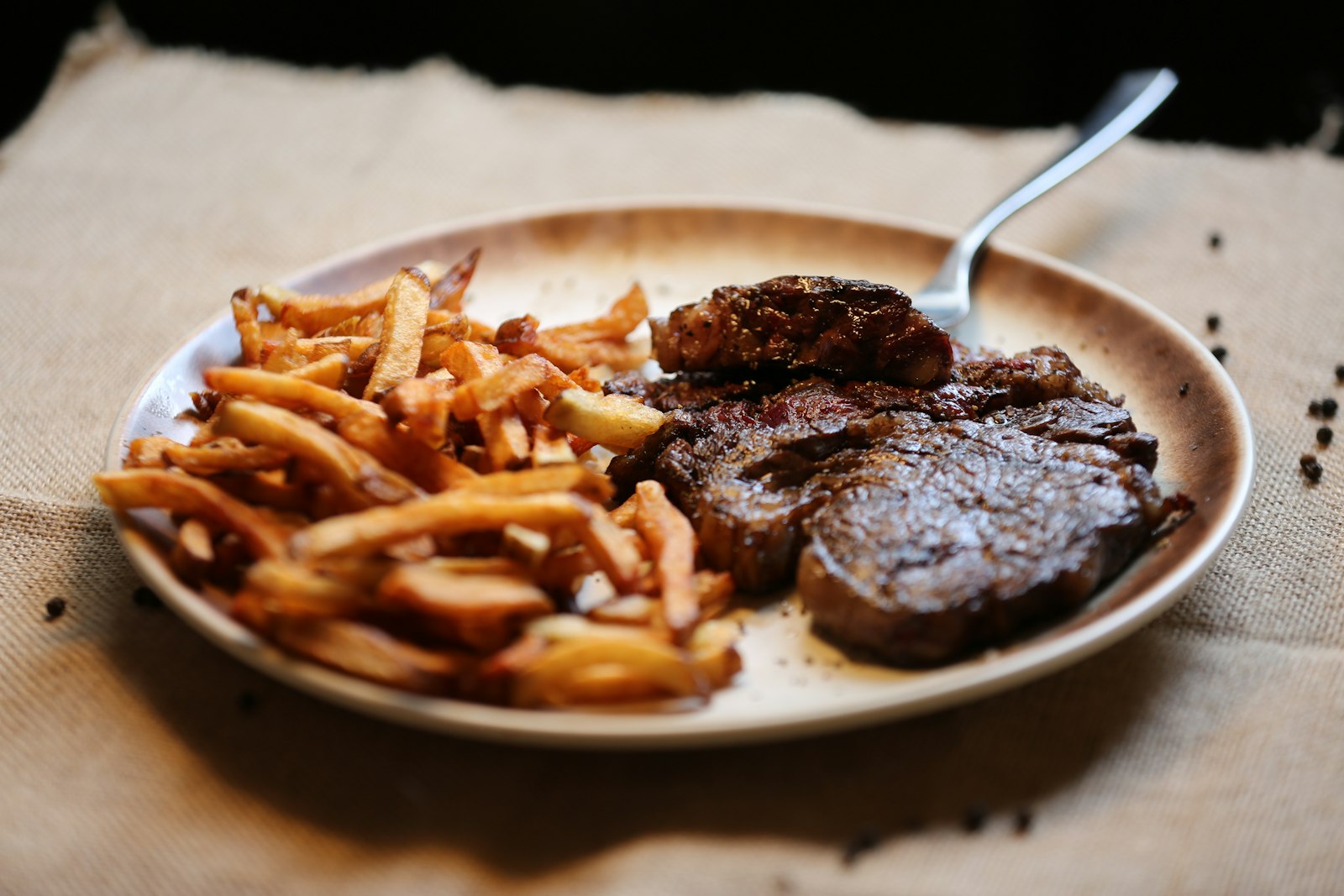 Seared steak with crispy roasted potatoes, a hearty sheet pan dinner