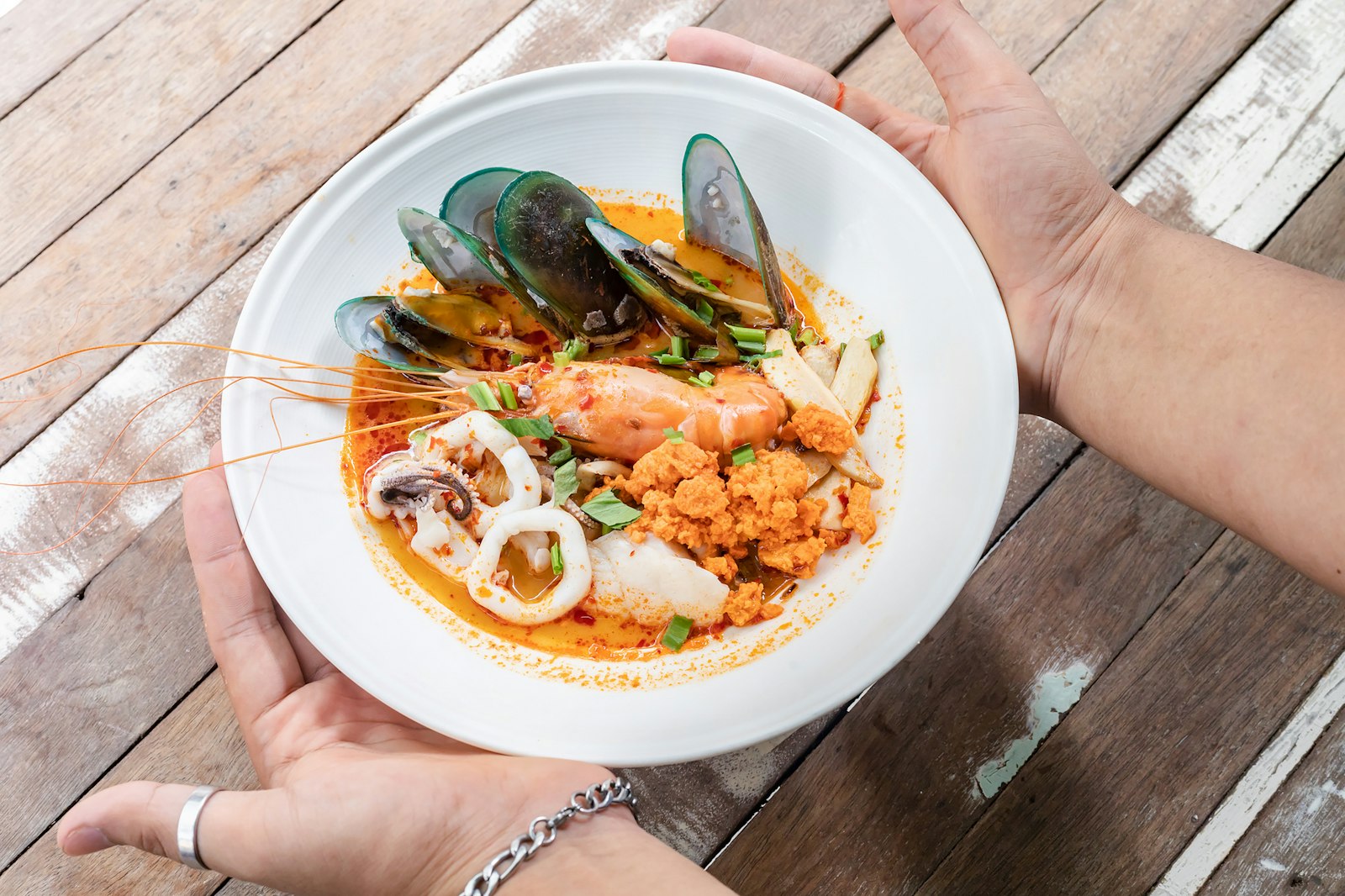 Hot and sour shrimp soup in a bowl