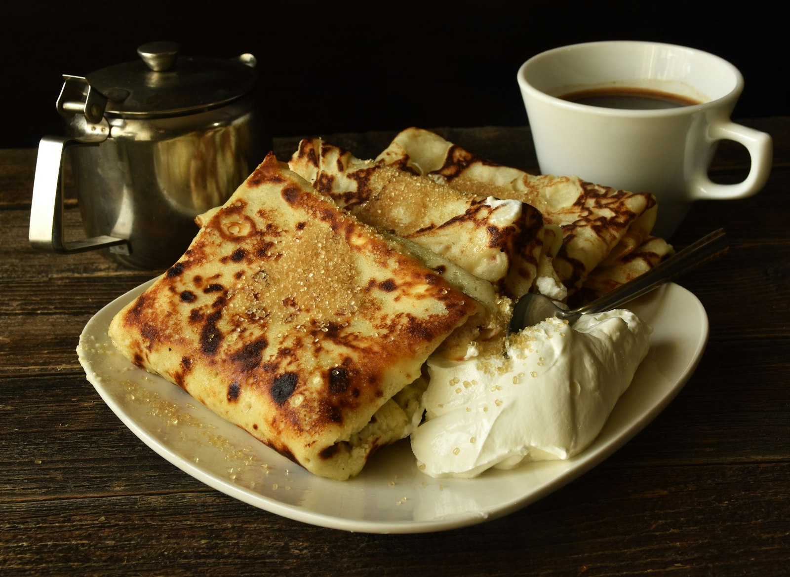 Golden baked flatbread with a cup of coffee