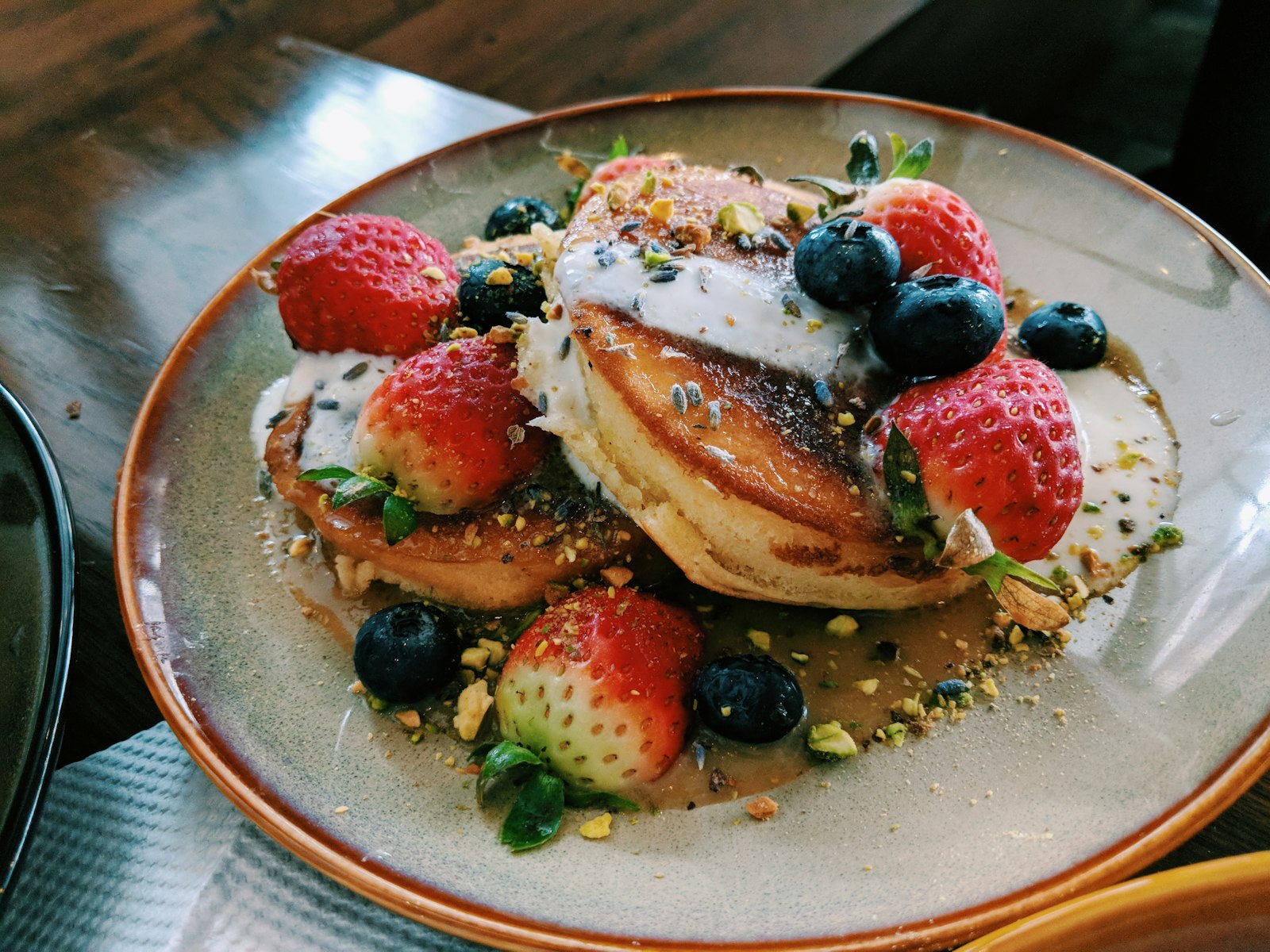 Stack of pancakes with fresh berries
