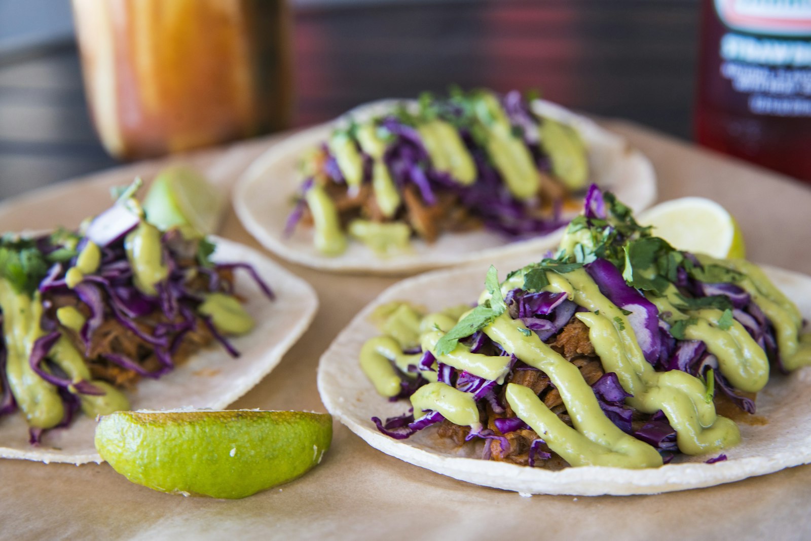 Crispy tacos with slaw and avocado sauce