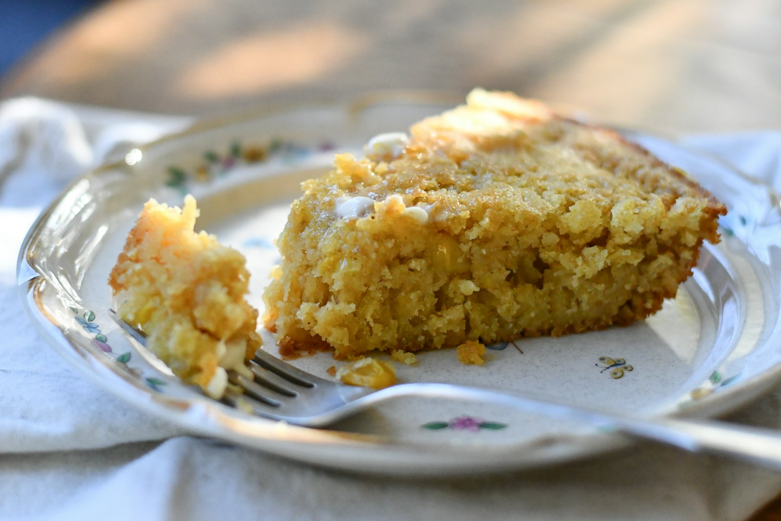 Slice of golden cornbread on a plate