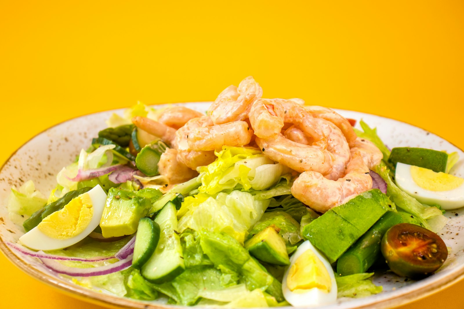 Deli shrimp salad with avocado and lettuce