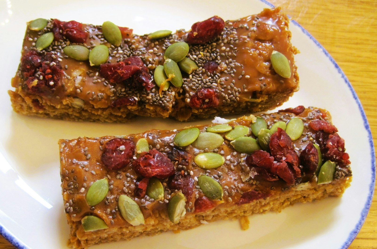 Chewy seed and fruit bars on a plate