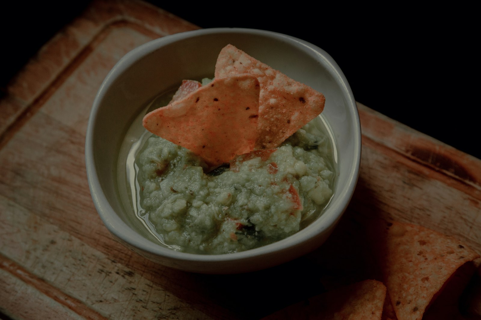 Holiday dip recipes: creamy artichoke dip with a chip