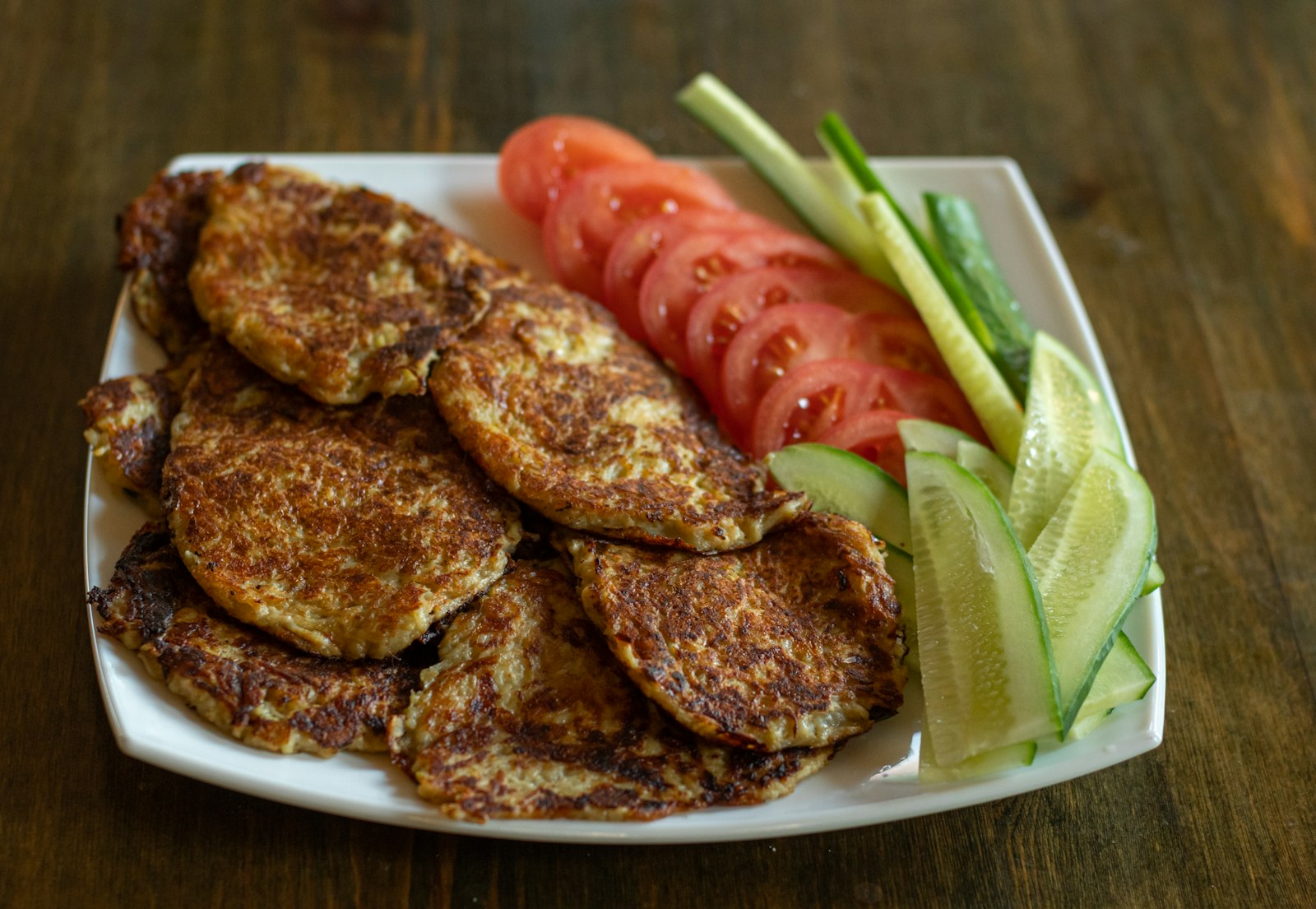 Hidden veggie recipes: golden zucchini fritters with tomatoes