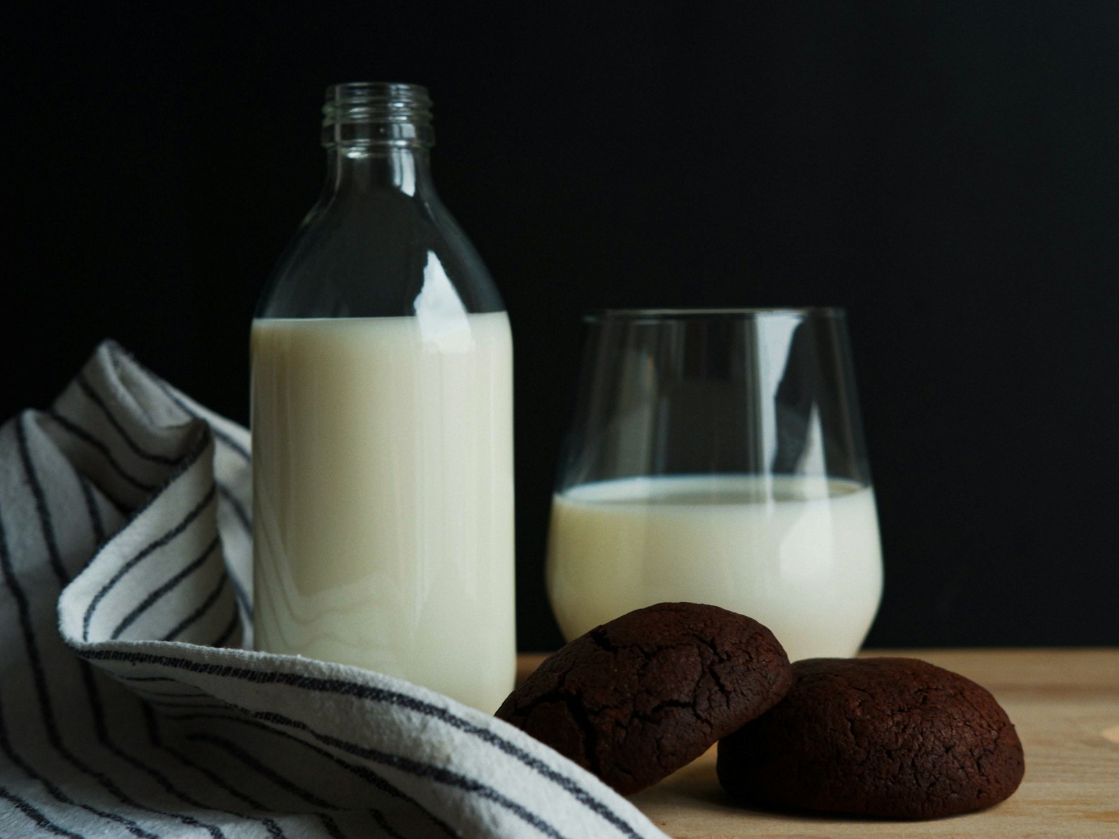 Homemade soy milk in a bottle and glass