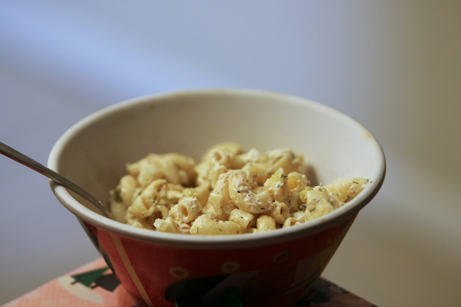 Bowl of classic creamy macaroni for a potluck