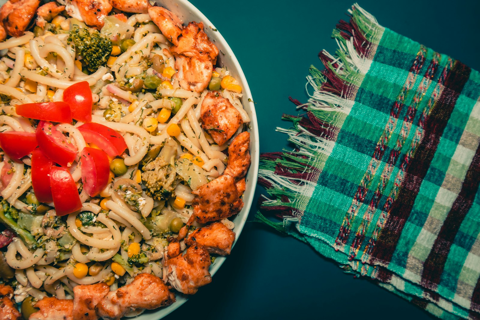 Cajun shrimp pasta salads with tomatoes and corn