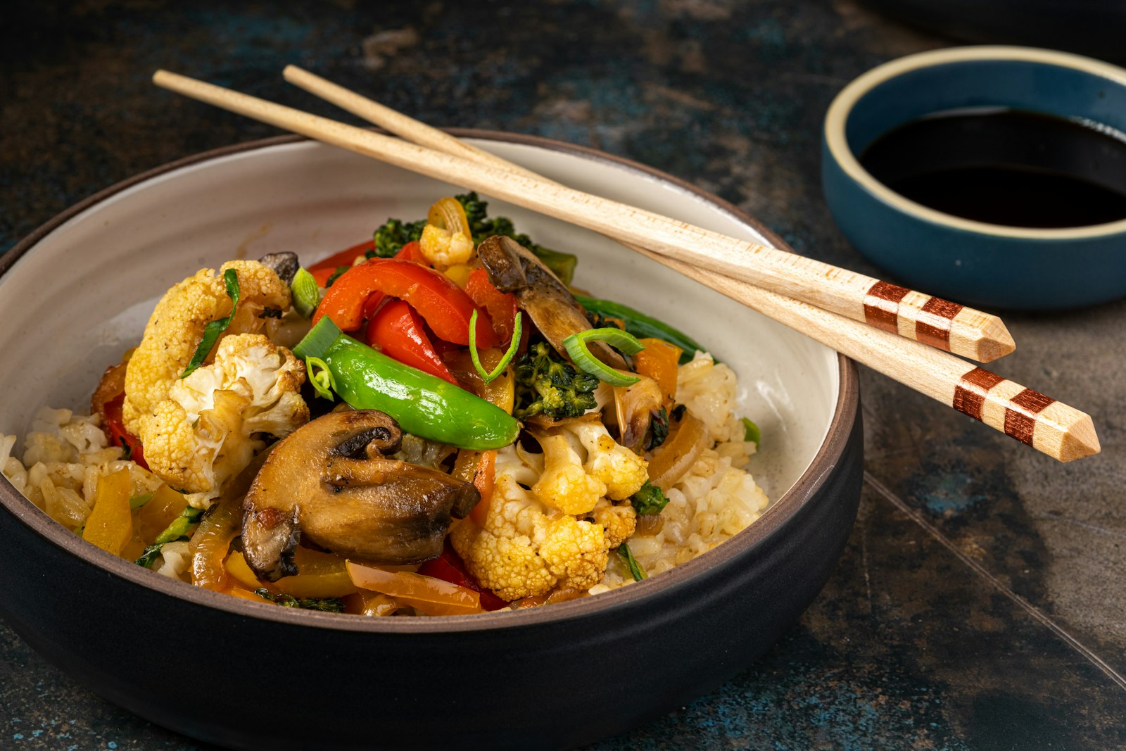Veggie fried rice style bowl with chopsticks