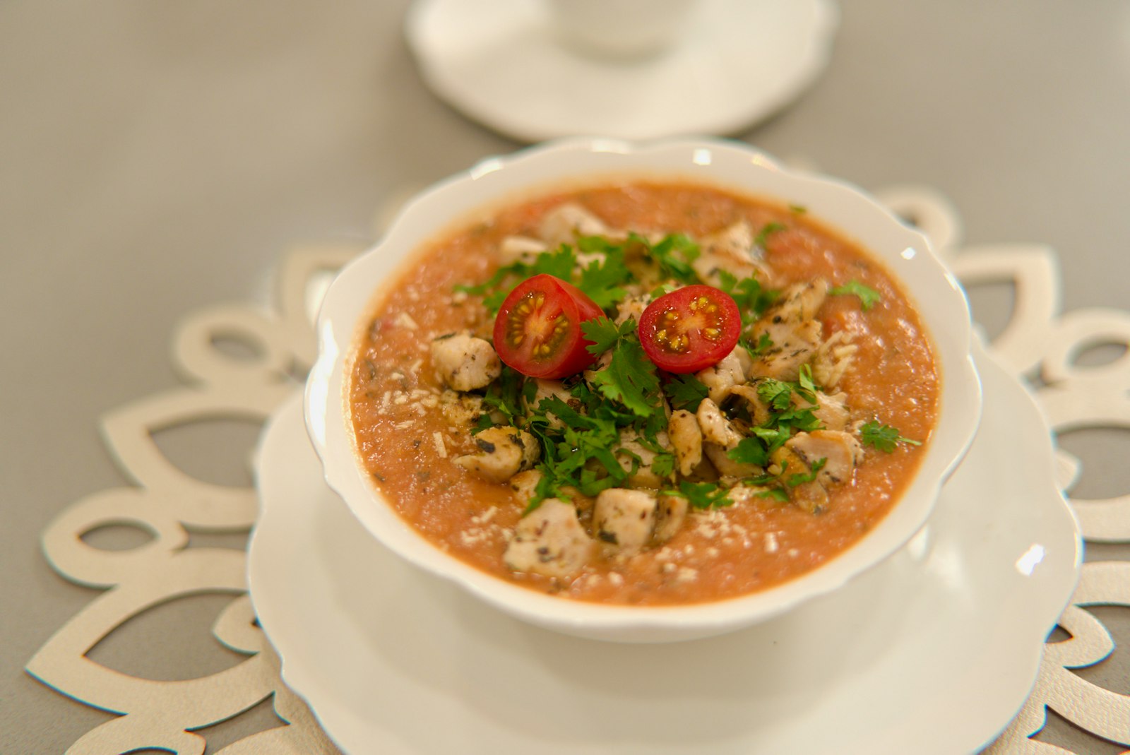 Tomato vegetable soup with fresh herbs