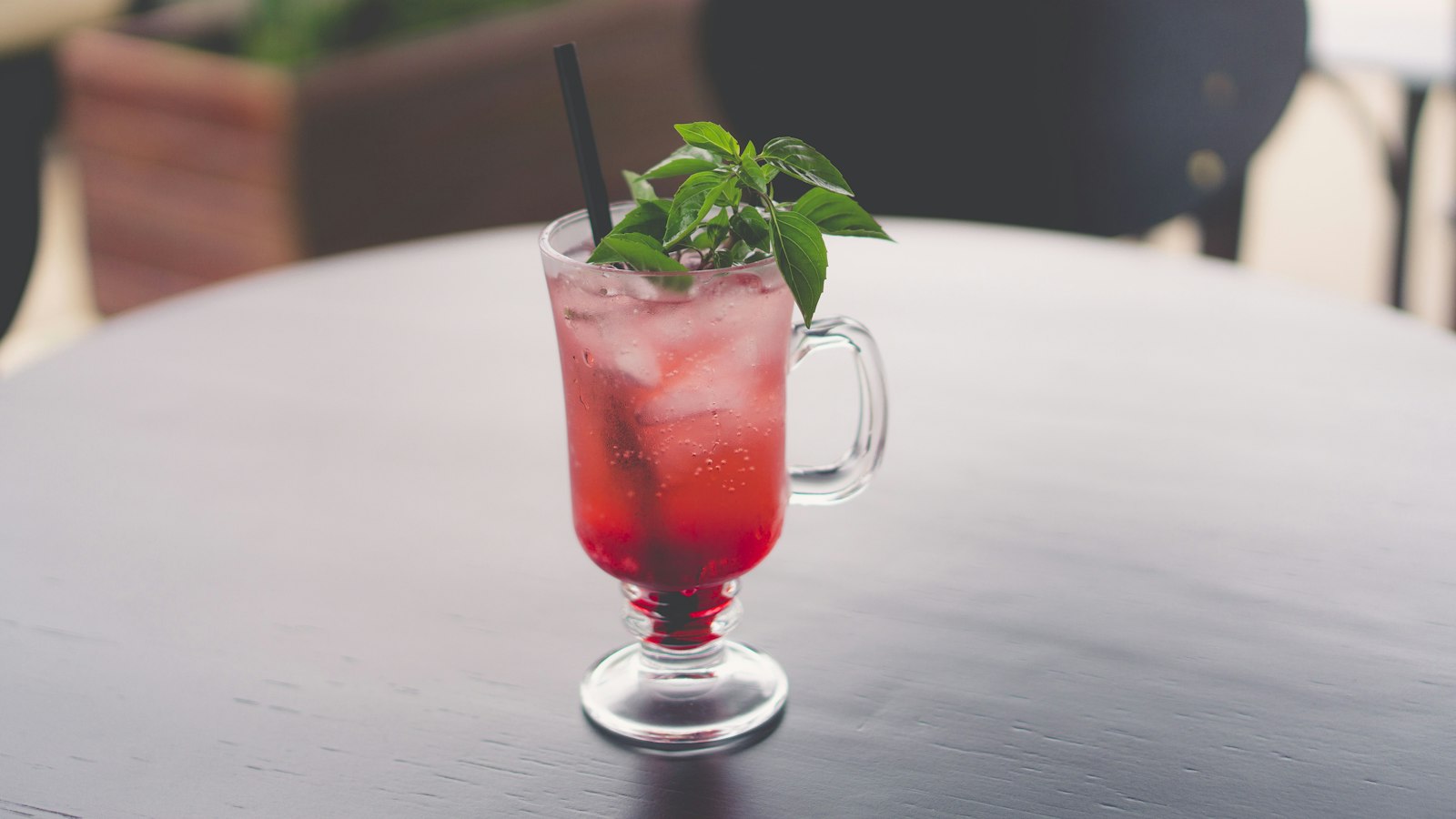 Blackberry mint sparkler in a glass mug