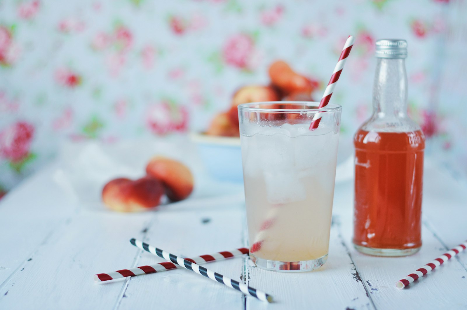 Peach soda with homemade peach syrup and fresh peaches