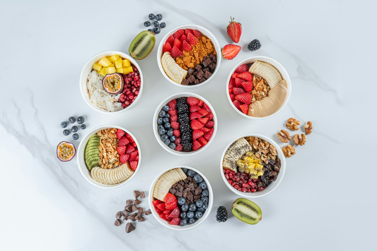 Smoothie bowls bar with fruit, granola and toppings for a crowd