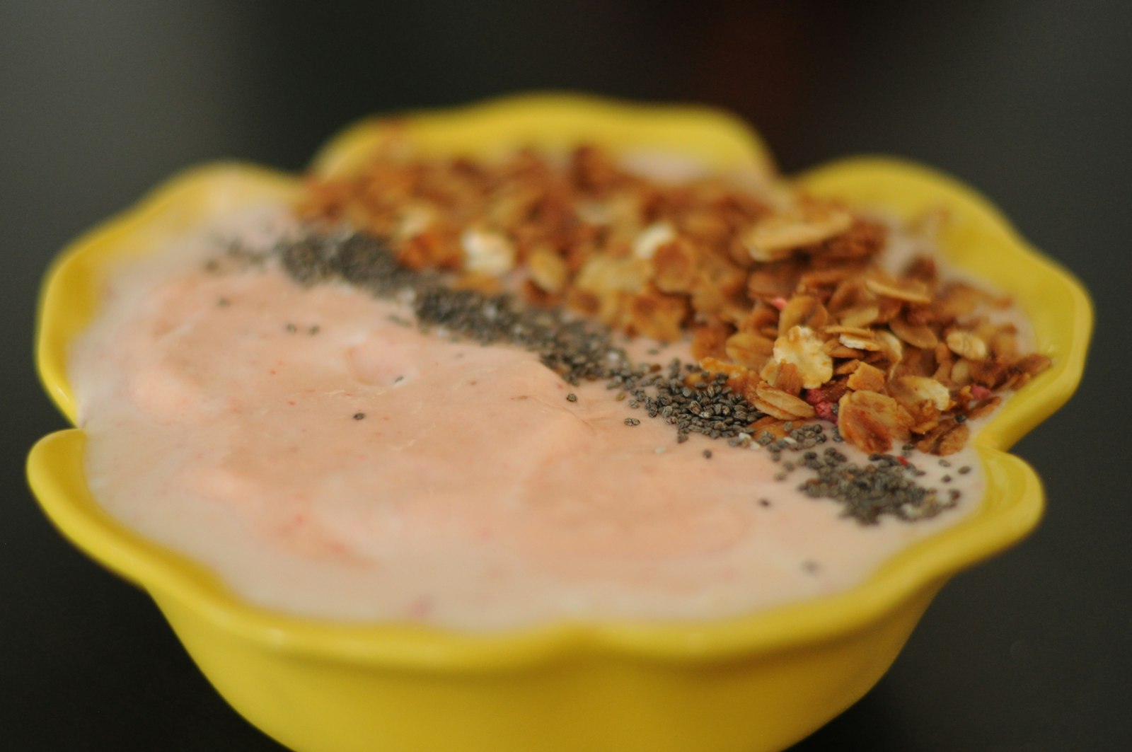 Peach mango smoothie bowls with chia seeds and granola