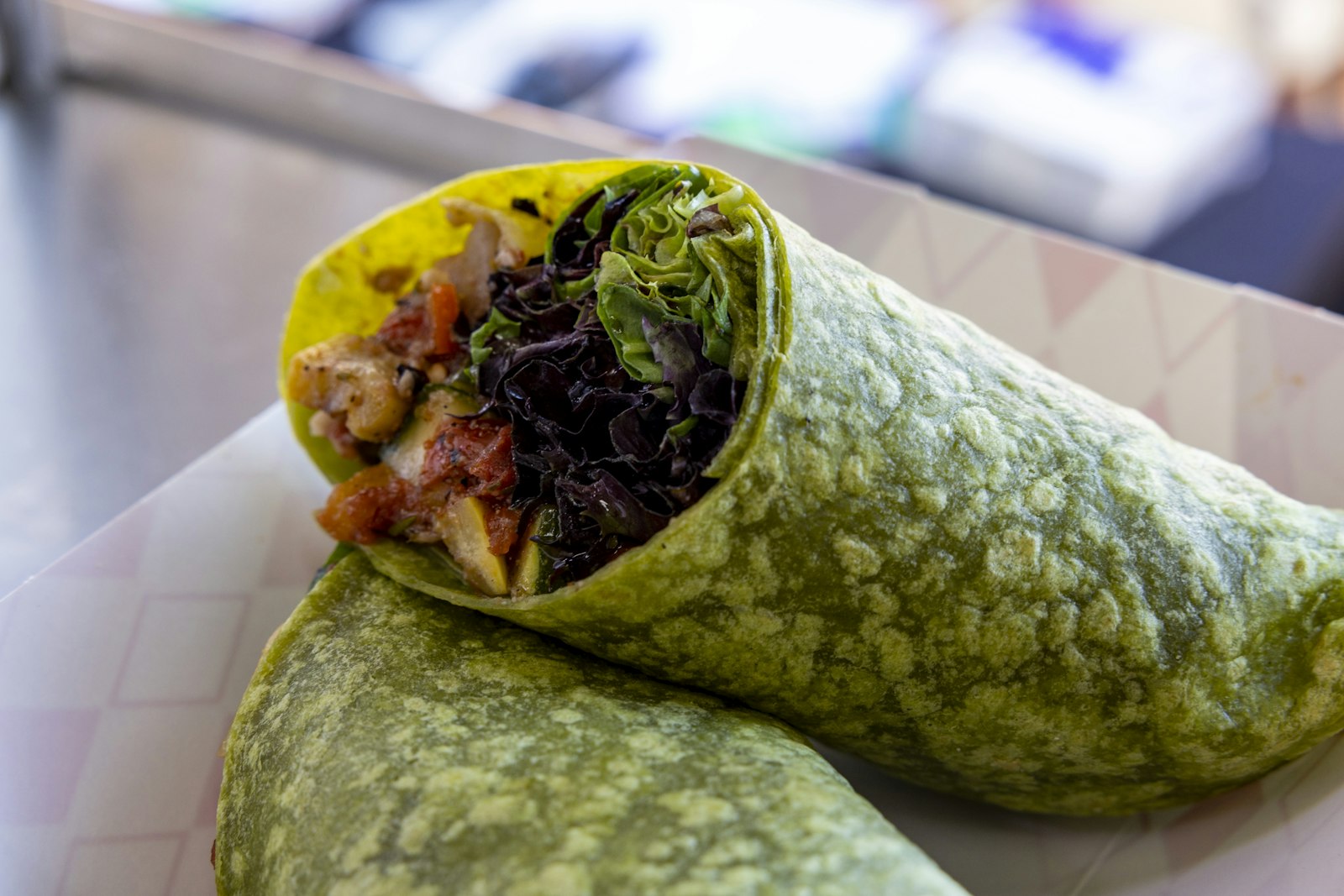 Spinach tortilla stuffed with grilled vegetables