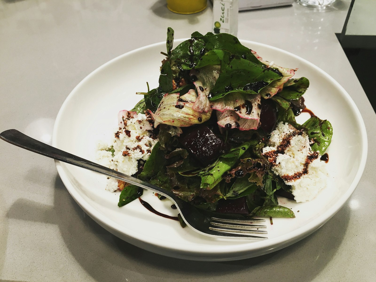 Beet salad with goat cheese and dark leafy greens