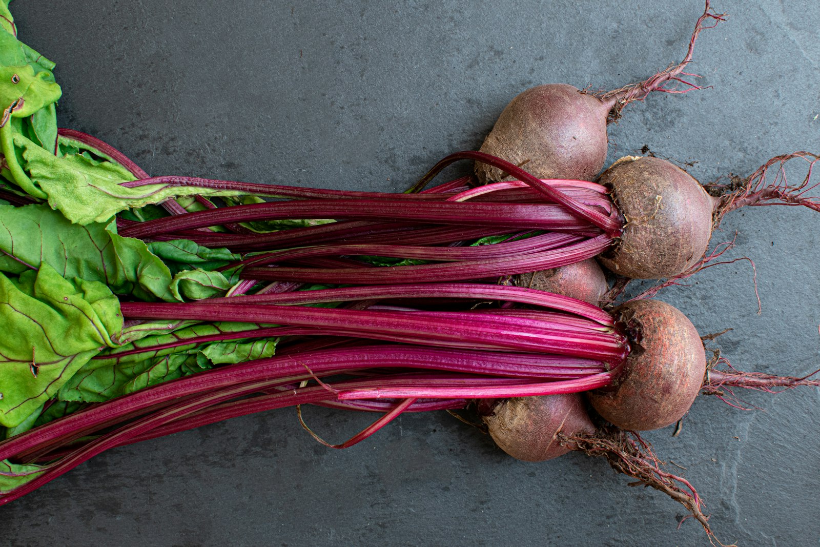 Bunch of fresh beets with leafy beet greens