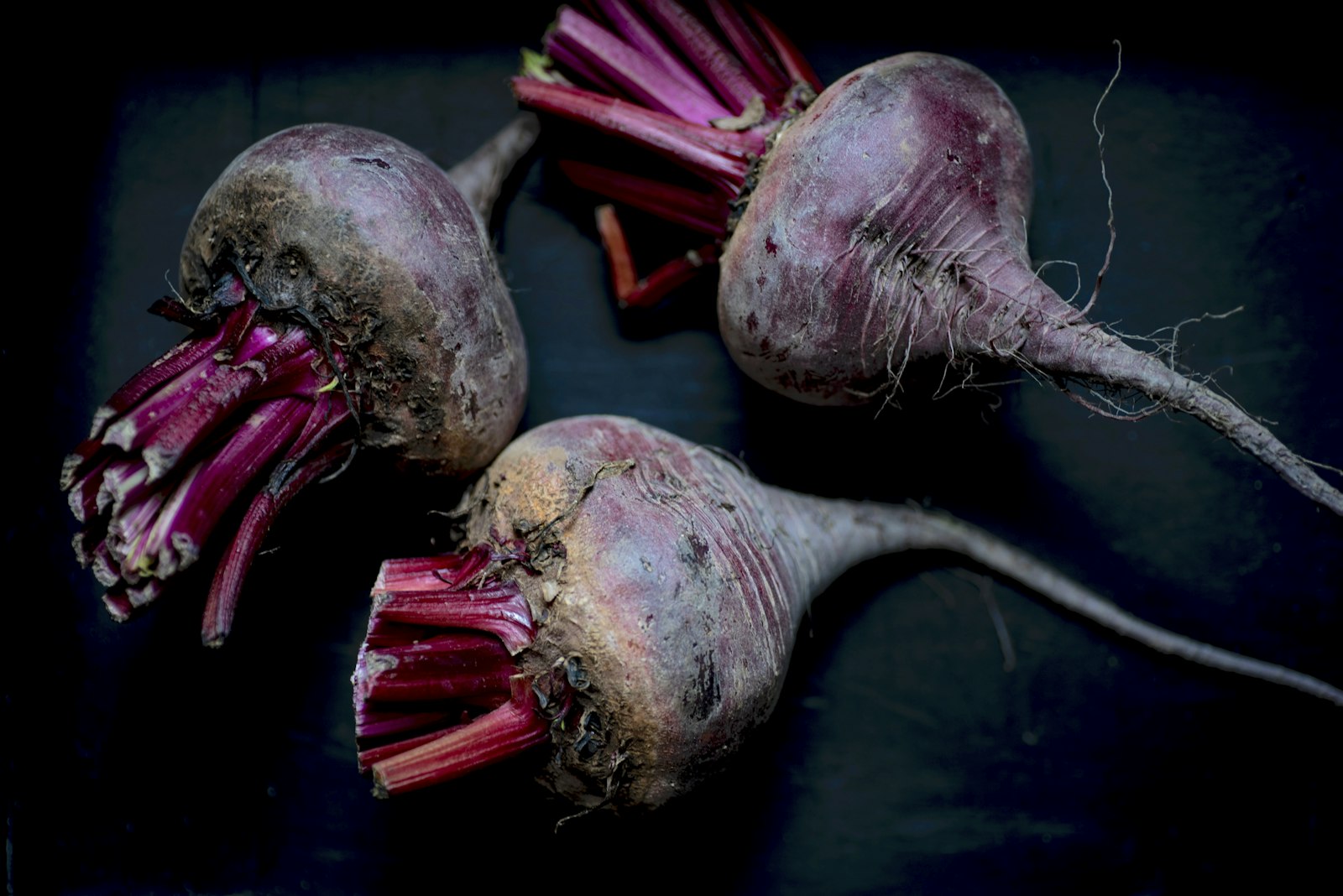 Whole beets with stems ready for roasting
