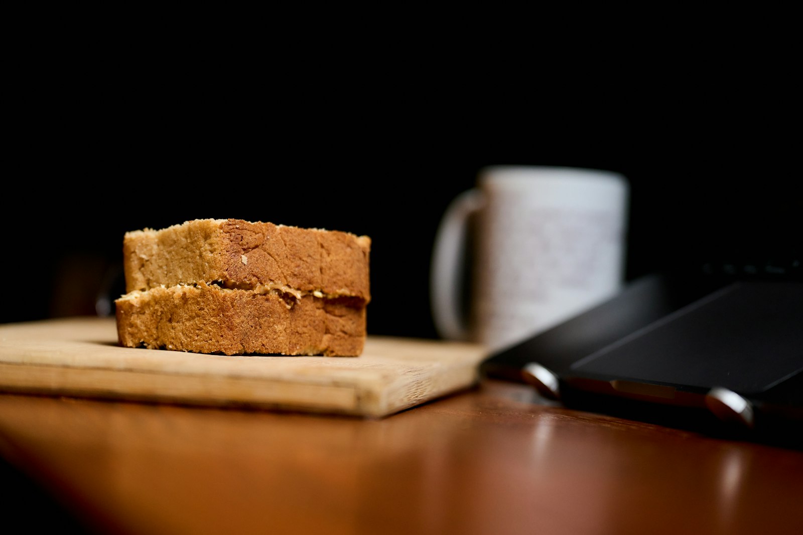 Pumpkin bread slices with a mug of coffee