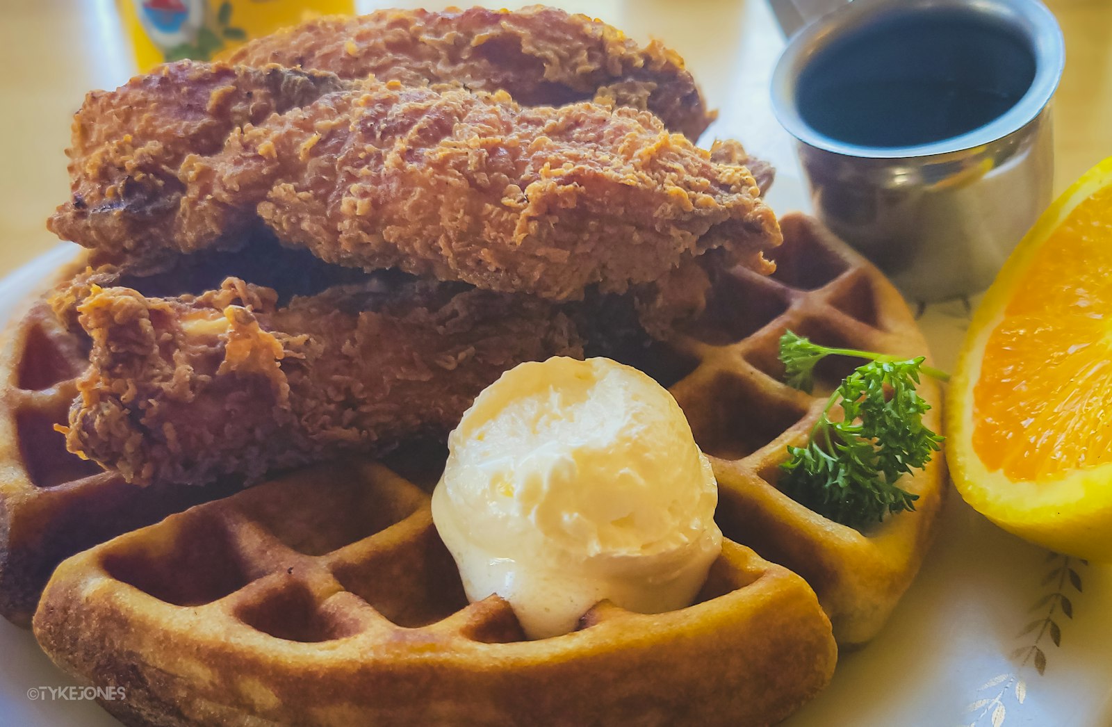 Fried chicken and waffles with butter