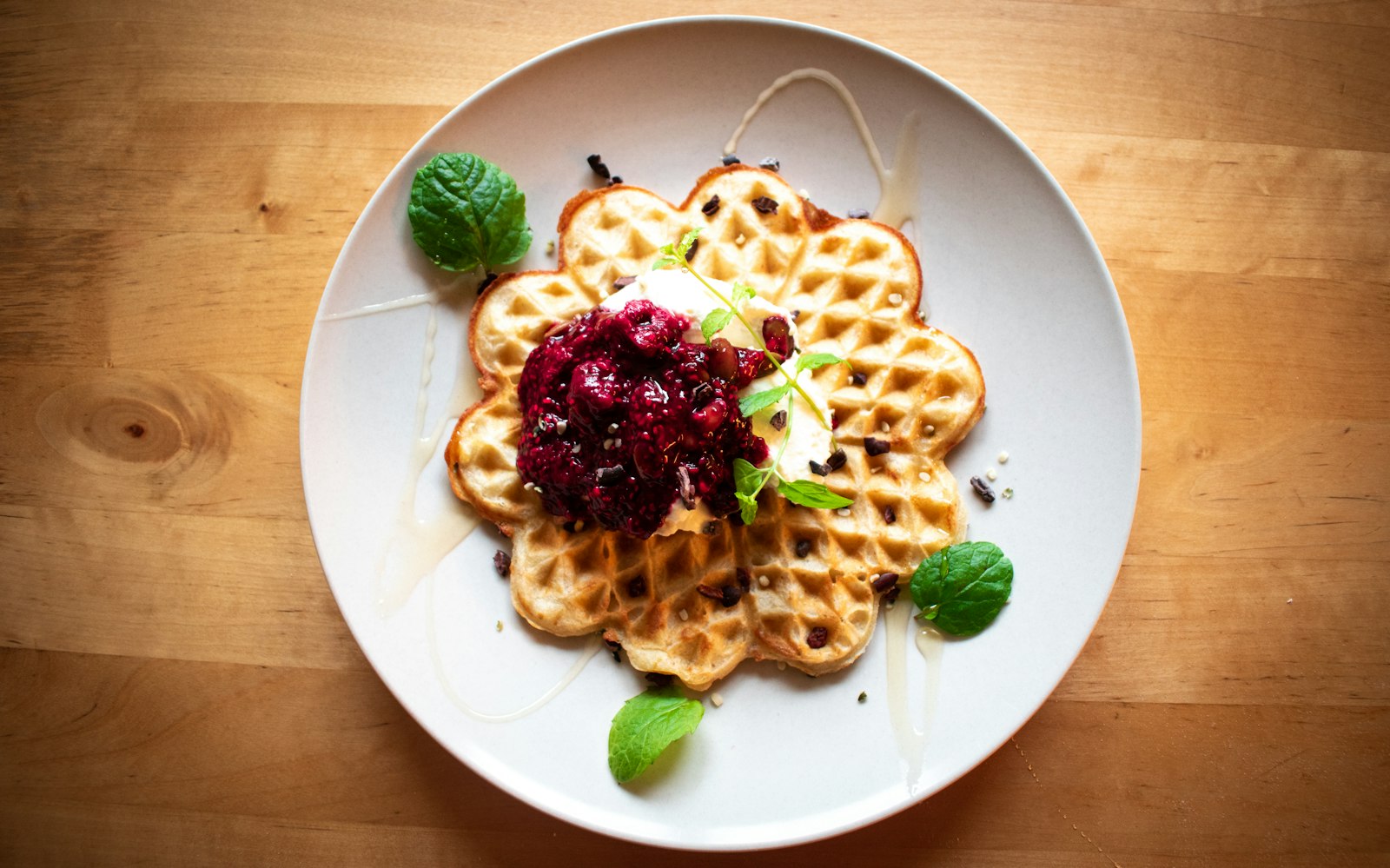 Heart shaped waffles with berry jam