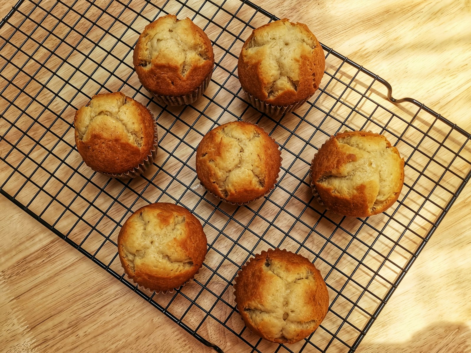 Banana cakes cooling on a wire rack