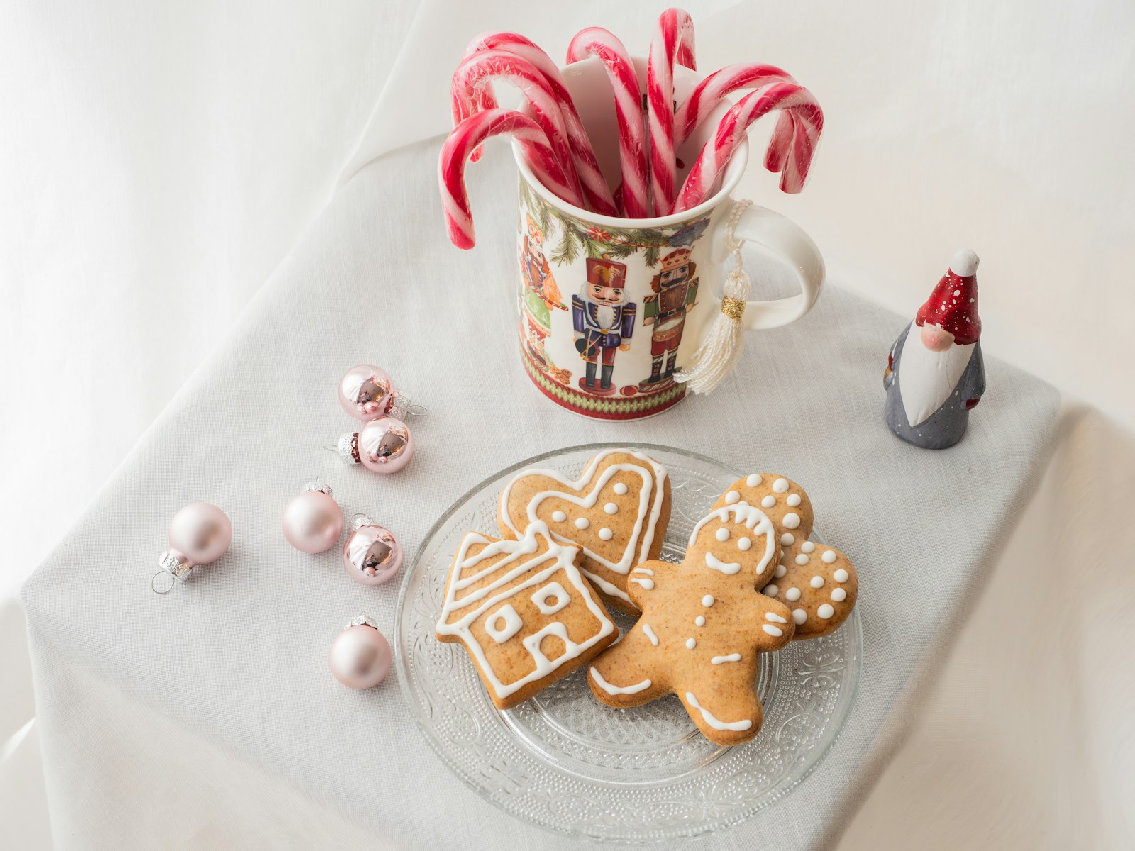 Holiday cookies with candy canes and a festive mug