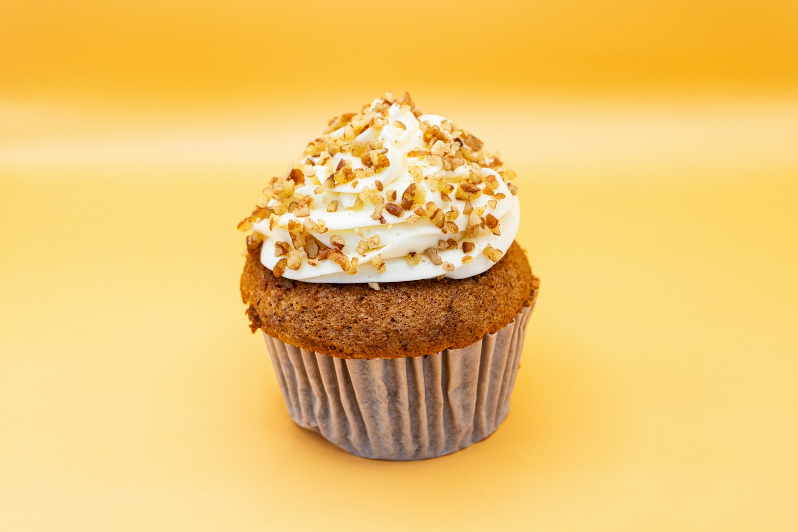 Carrot cake cupcake with cream cheese frosting