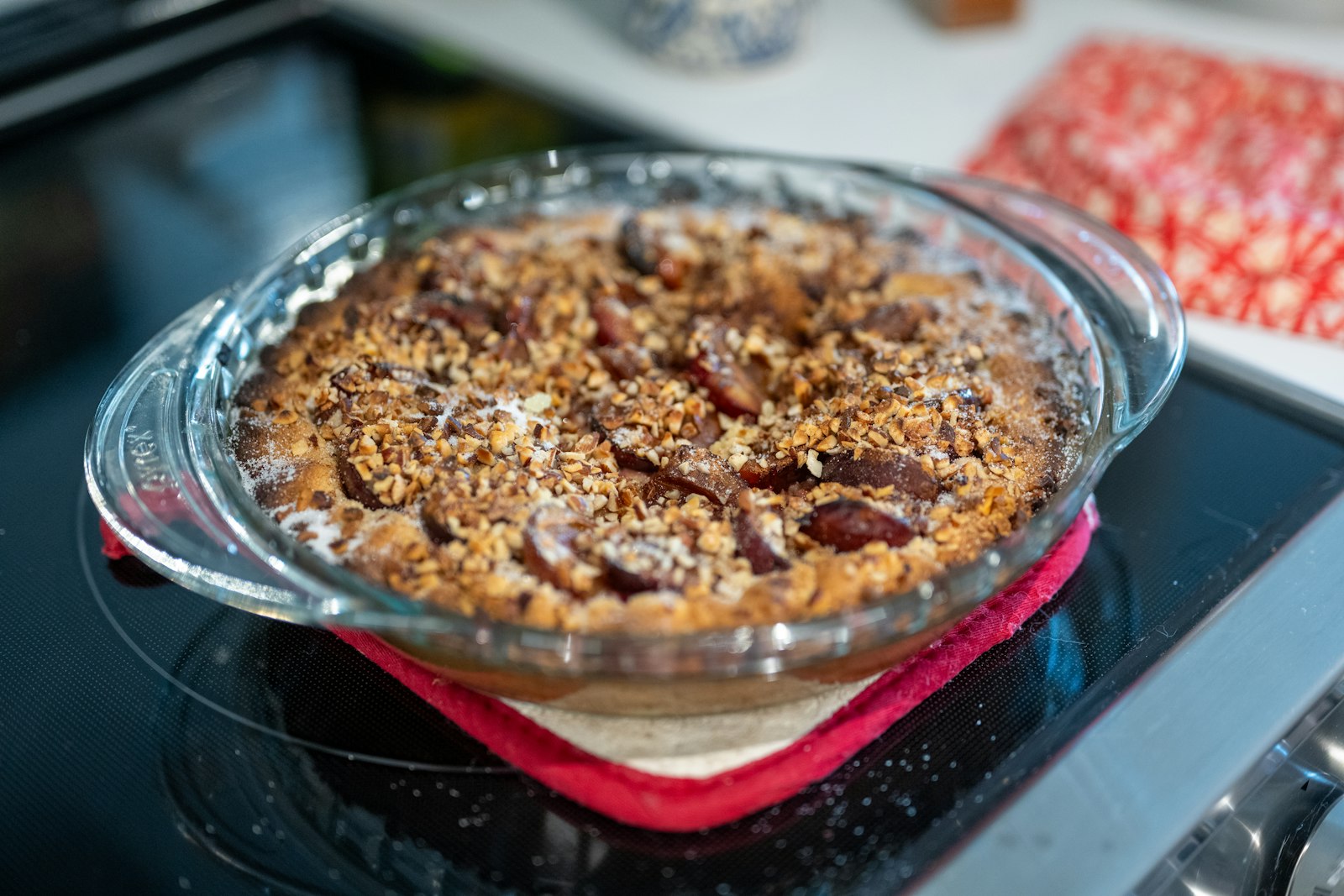 Mixed berry crisp baked in a glass dish