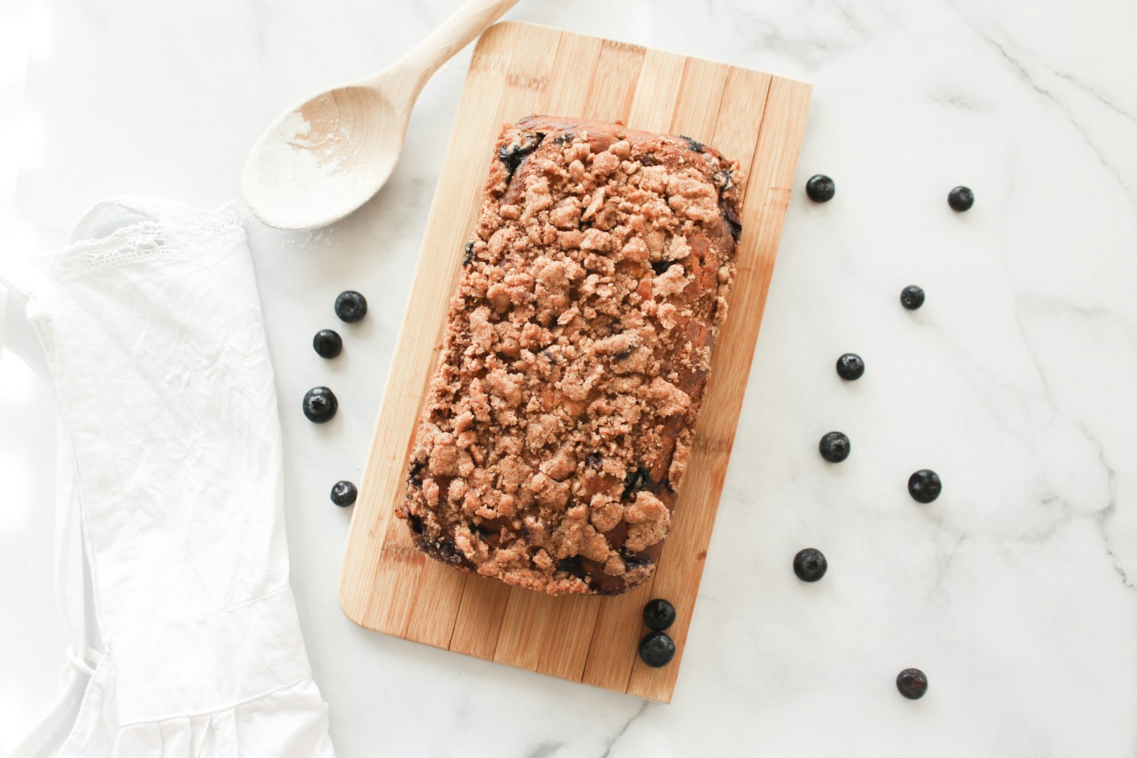 Blueberry loaf with streusel on a plate