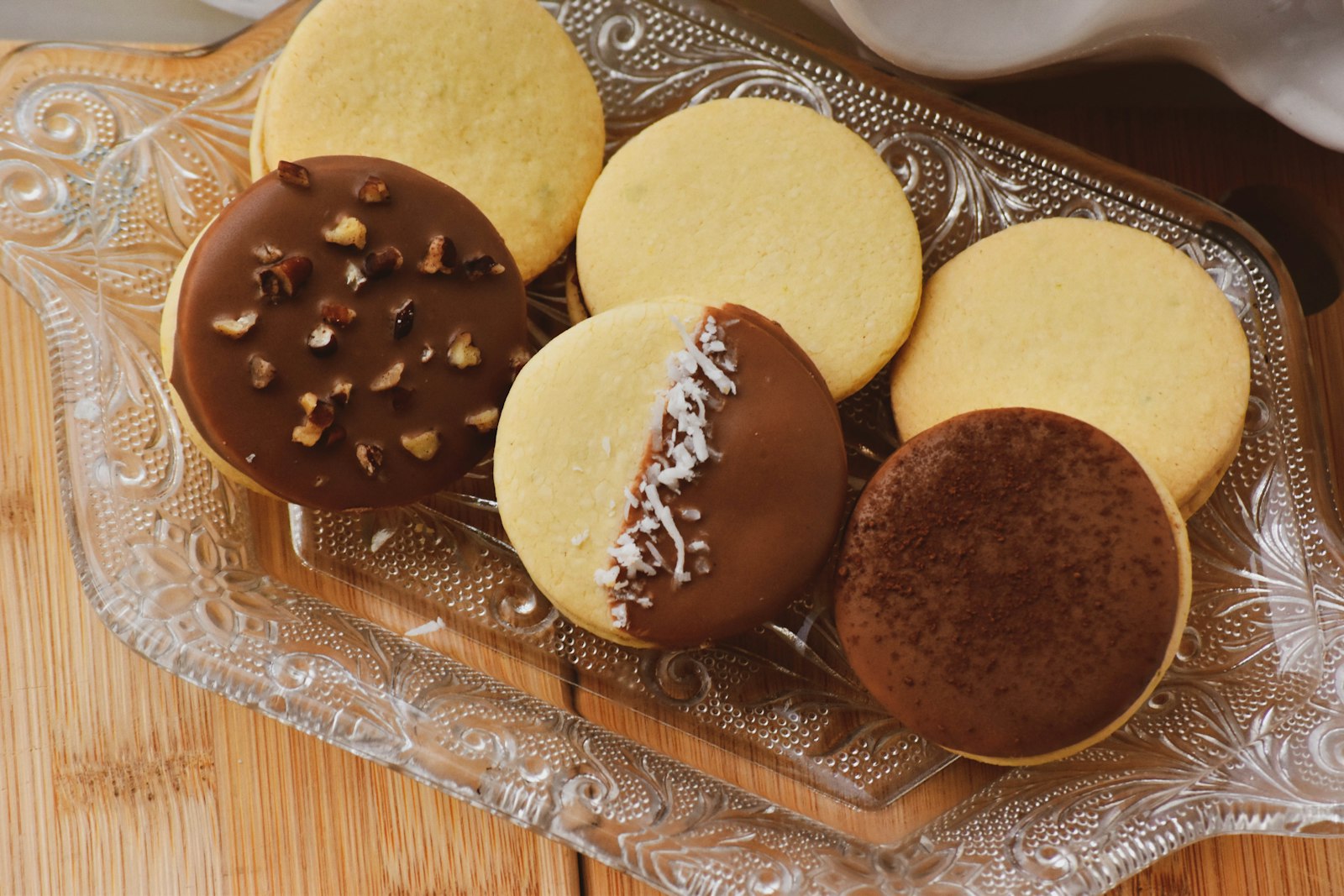 Half dipped butter cookies with nuts
