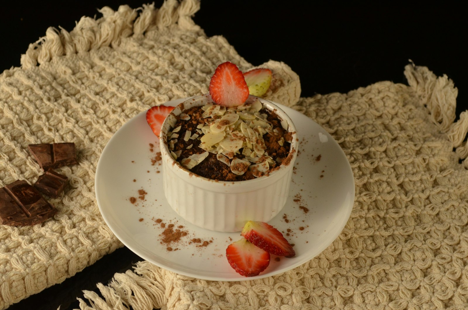 Chocolate rice porridge in a white ramekin