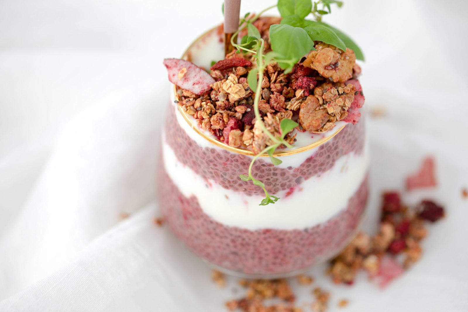 Chia pudding layered with berries and granola