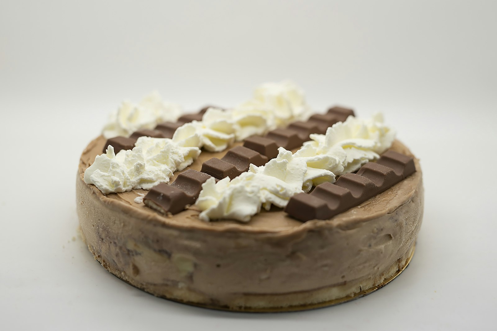 Chocolate mint cheesecake with cream swirls
