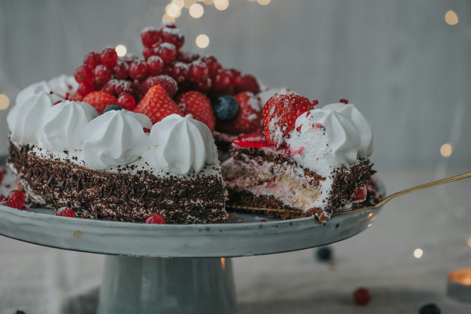 Cream torte topped with fresh berries