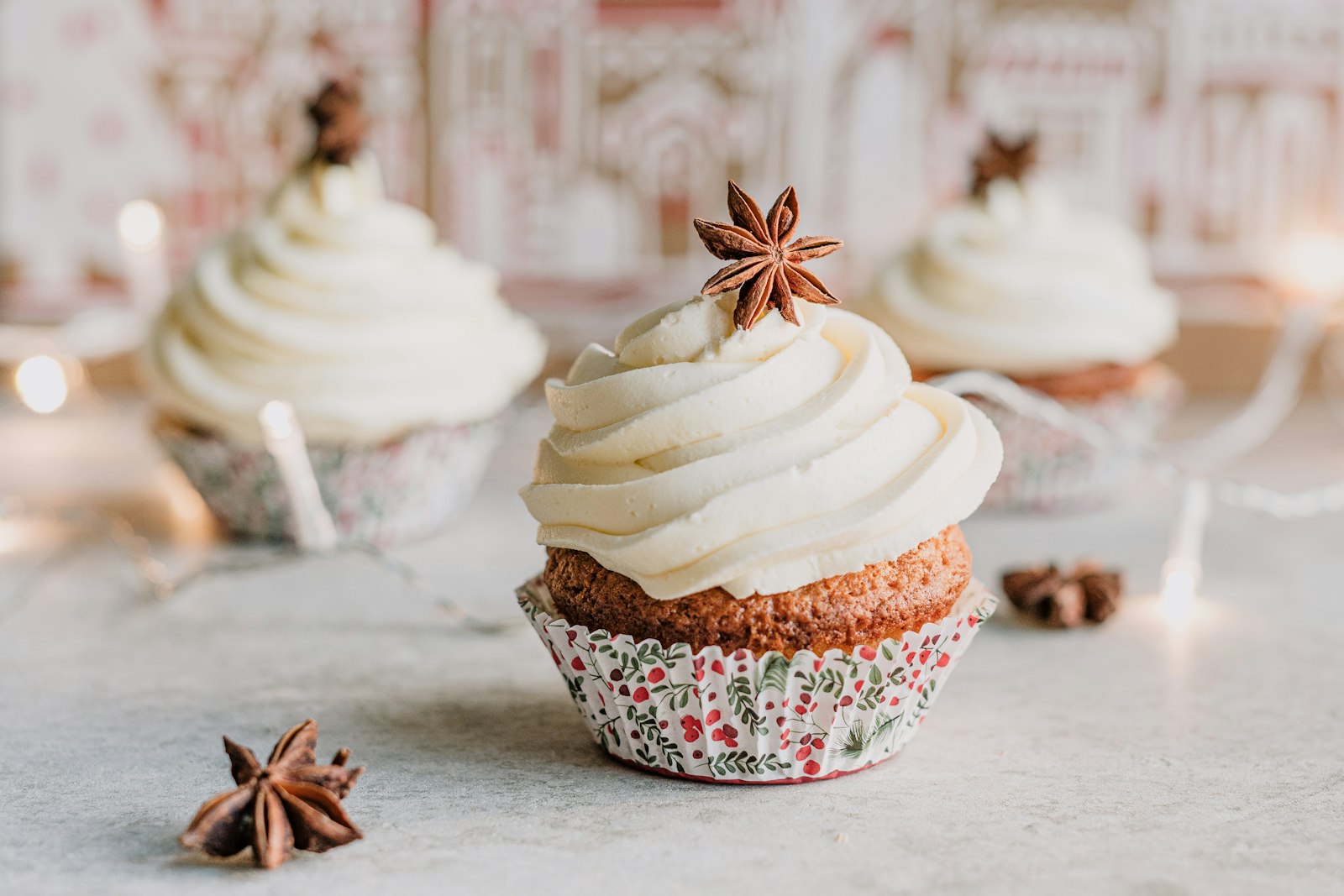 Spice cupcakes with cream cheese frosting and star anise