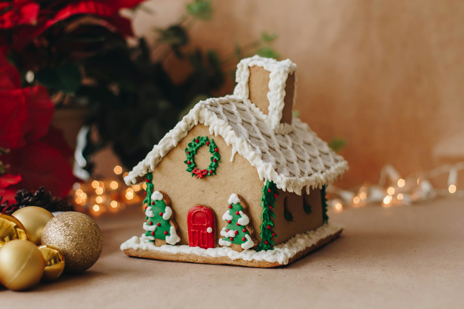Gingerbread house with candy and icing snow