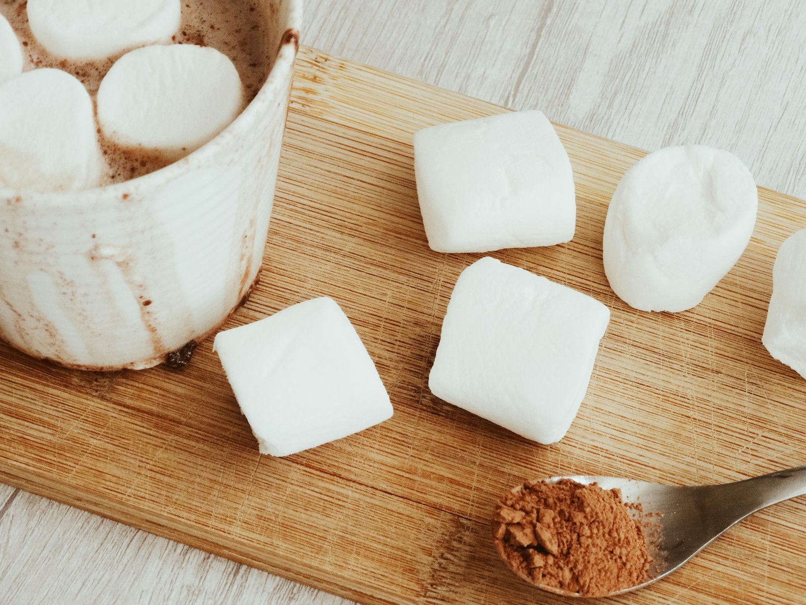 Fluffy homemade marshmallows on a board