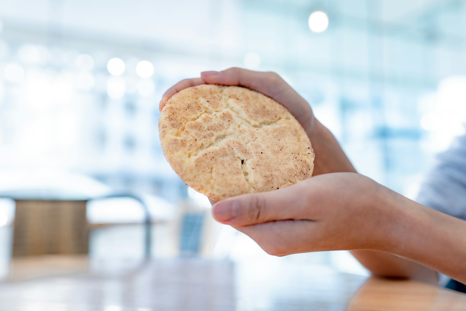 Hand holding a homemade round hand pie