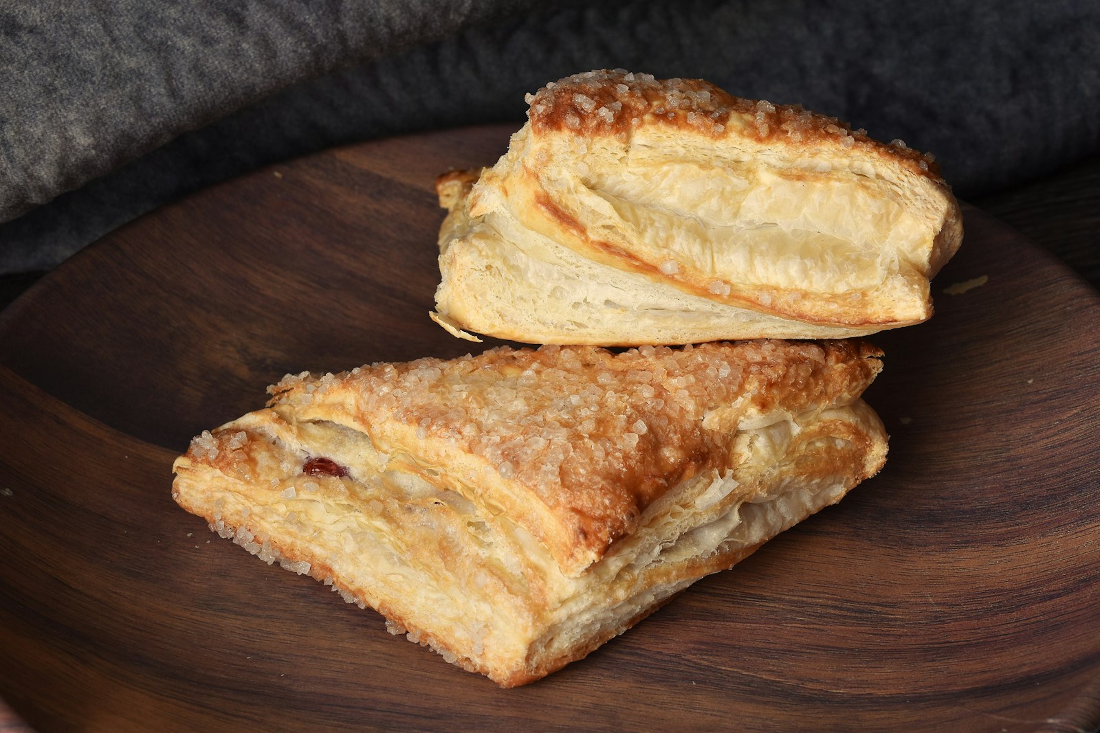 Golden cream cheese turnovers on a board