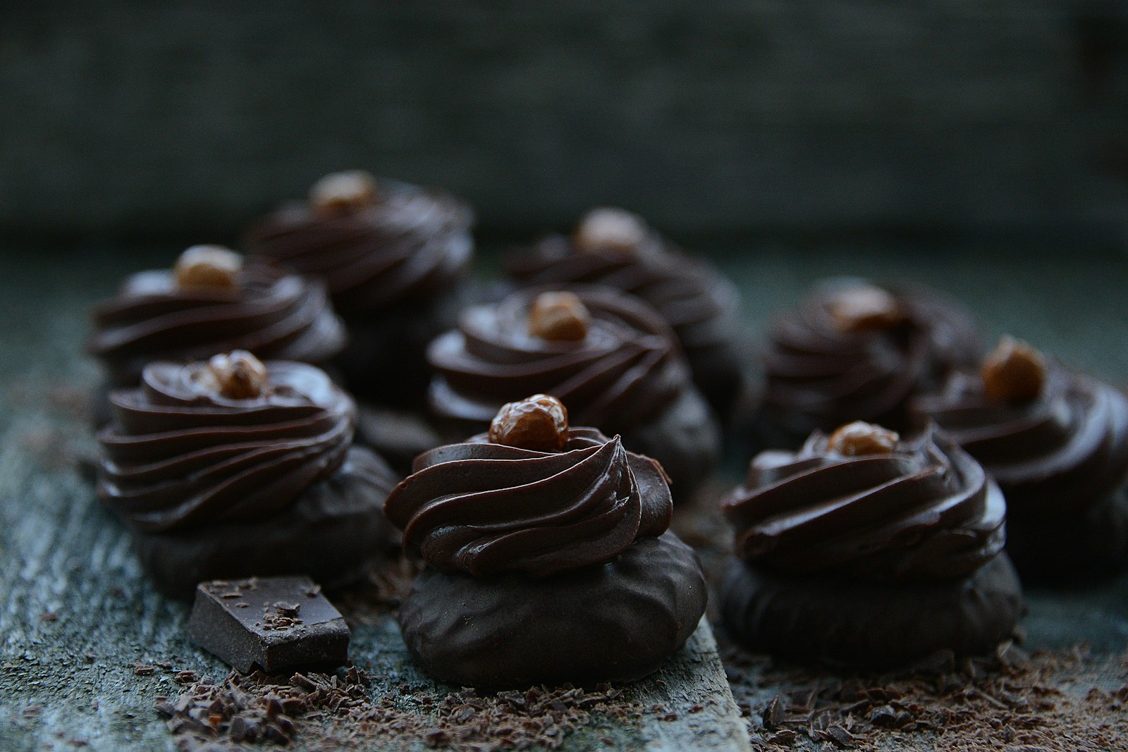 Chocolate truffles topped with hazelnuts